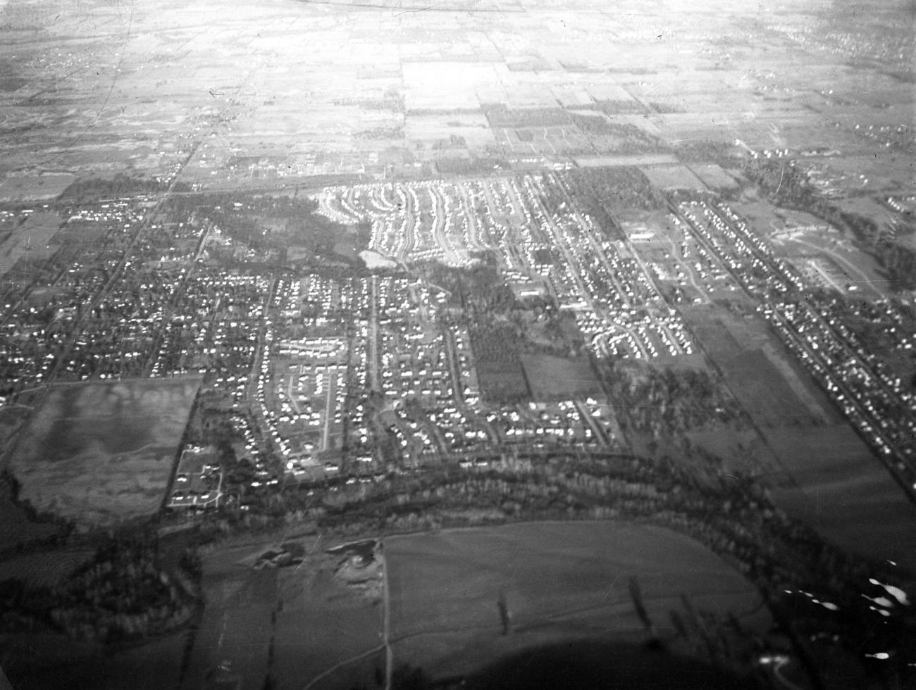Black and white aerial photo of neighborhoods