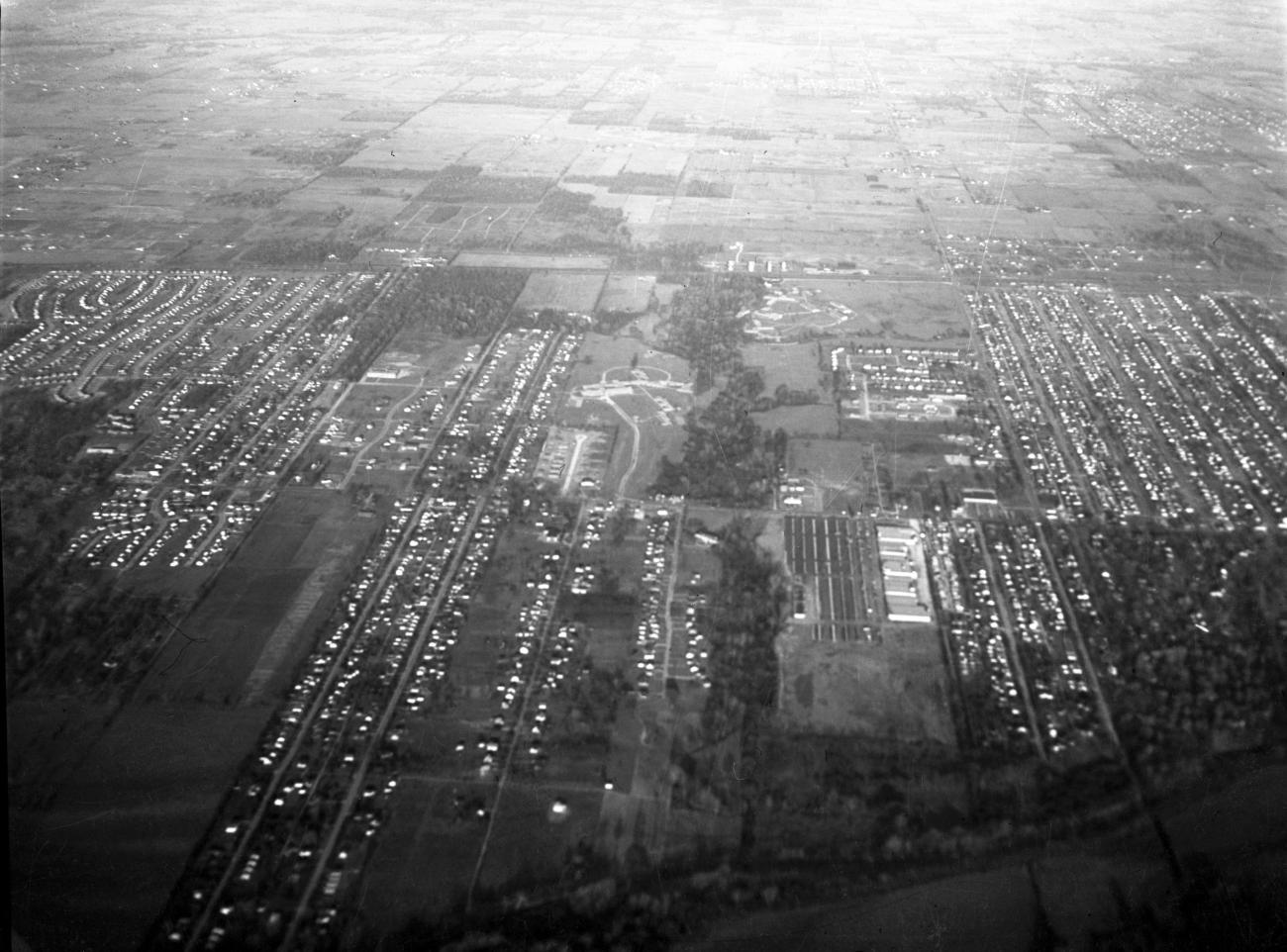 Black and white aerial photo of neighborhoods