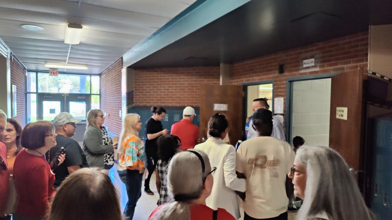 Attendees at the Thomas Worthington High School Alumni Tour, Gathered in Front of a Room