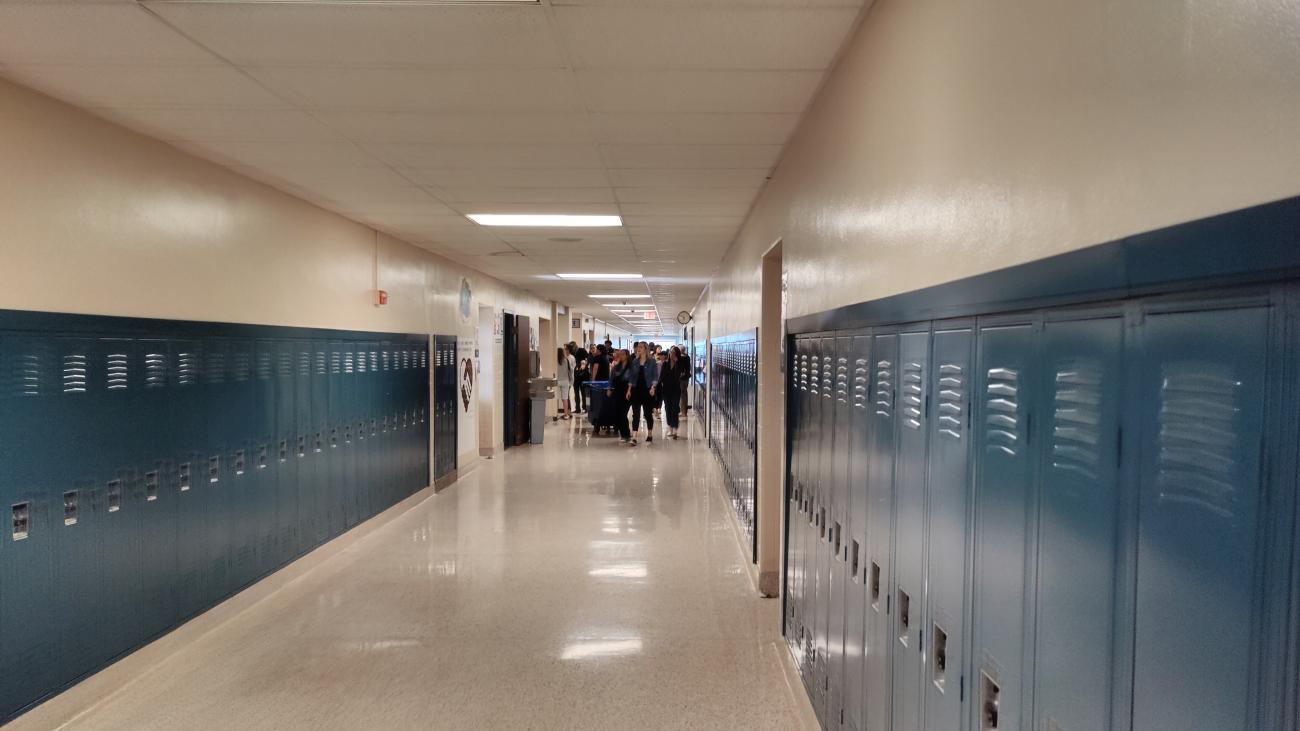 Attendees at the Thomas Worthington High School Alumni Tour, Walking Down Hallway