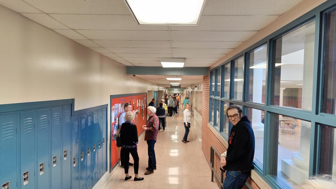 Attendees at the Thomas Worthington High School Alumni Tour, Standing in Hallway