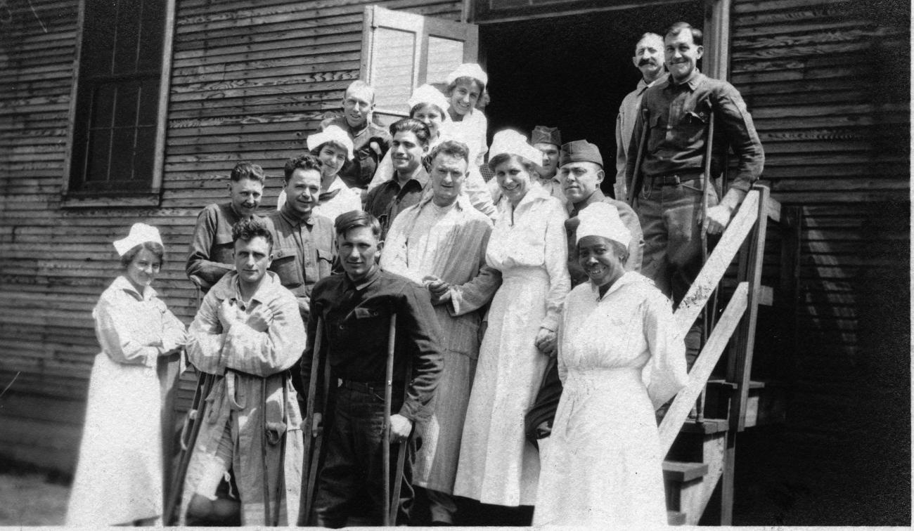 Charles Wing, Clara Rollins and Group of People at Camp Sherman