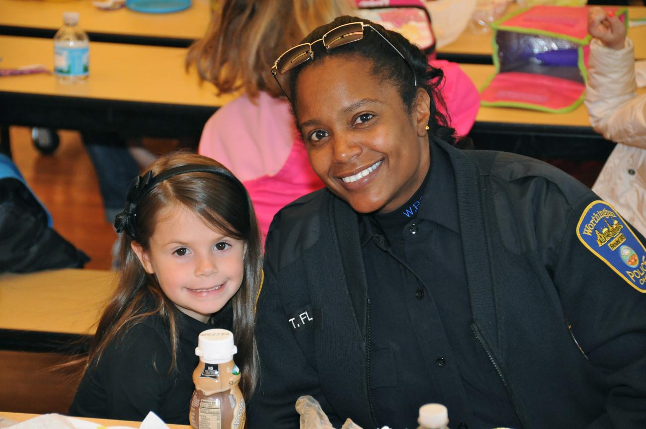Community Resource Officer Tammy Floyd and Student at “Lunch with an Officer”