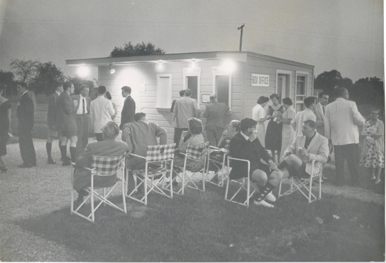 Crowd Gathered Around the Box Office at Playhouse on the Green
