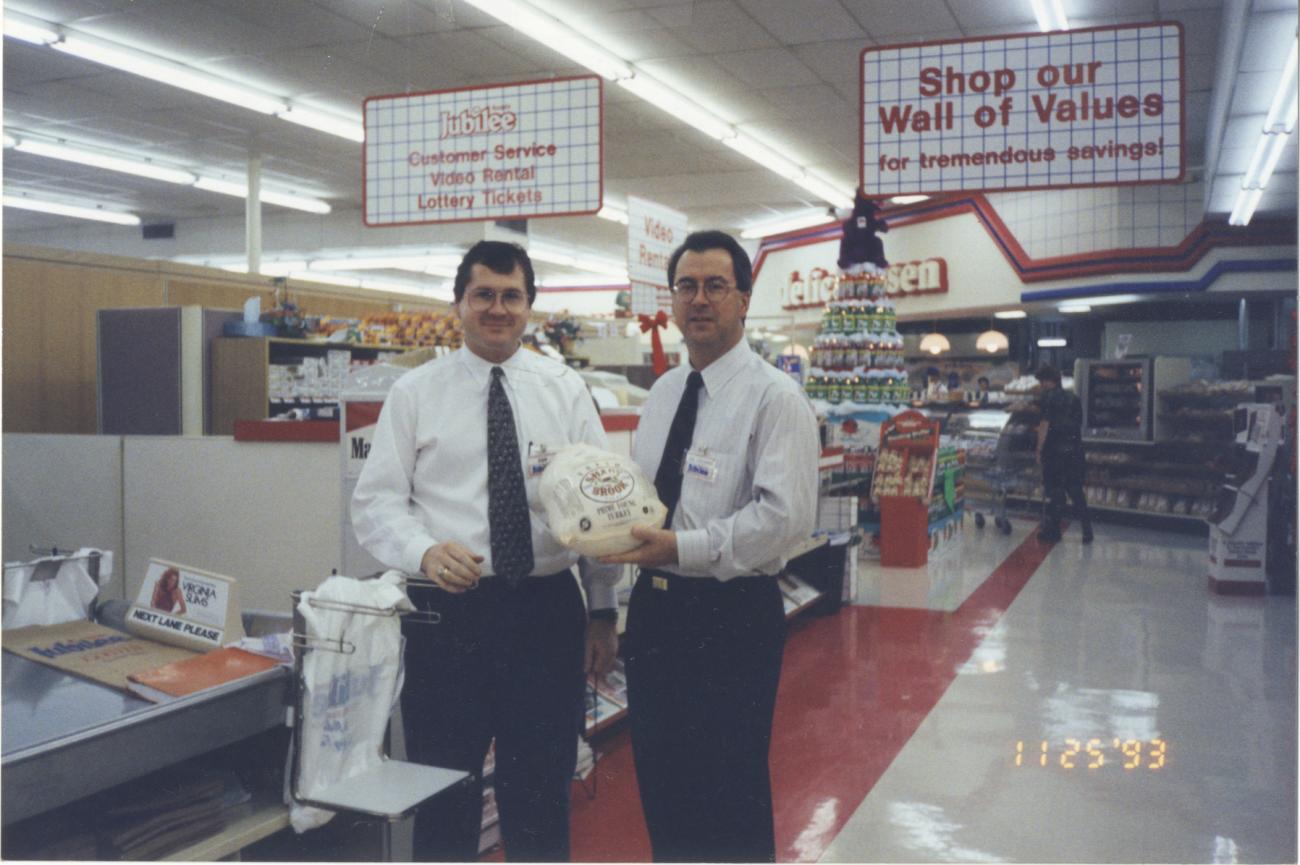 Dan Lauer and Joe Cousins Standing Inside Jubilee Grocery Store