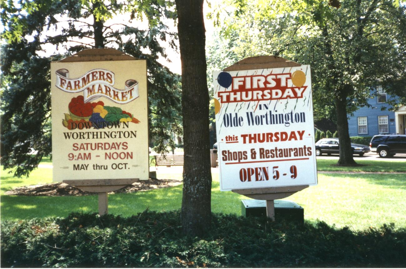 Farmers Market and First Thursday in Olde Worthington Signs on the Village Green
