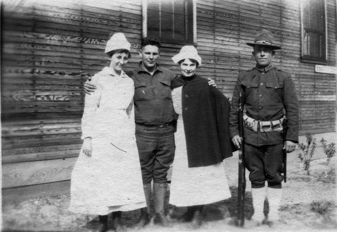 Harriet Elizabeth Putman and Three Unidentified People at Camp Sherman