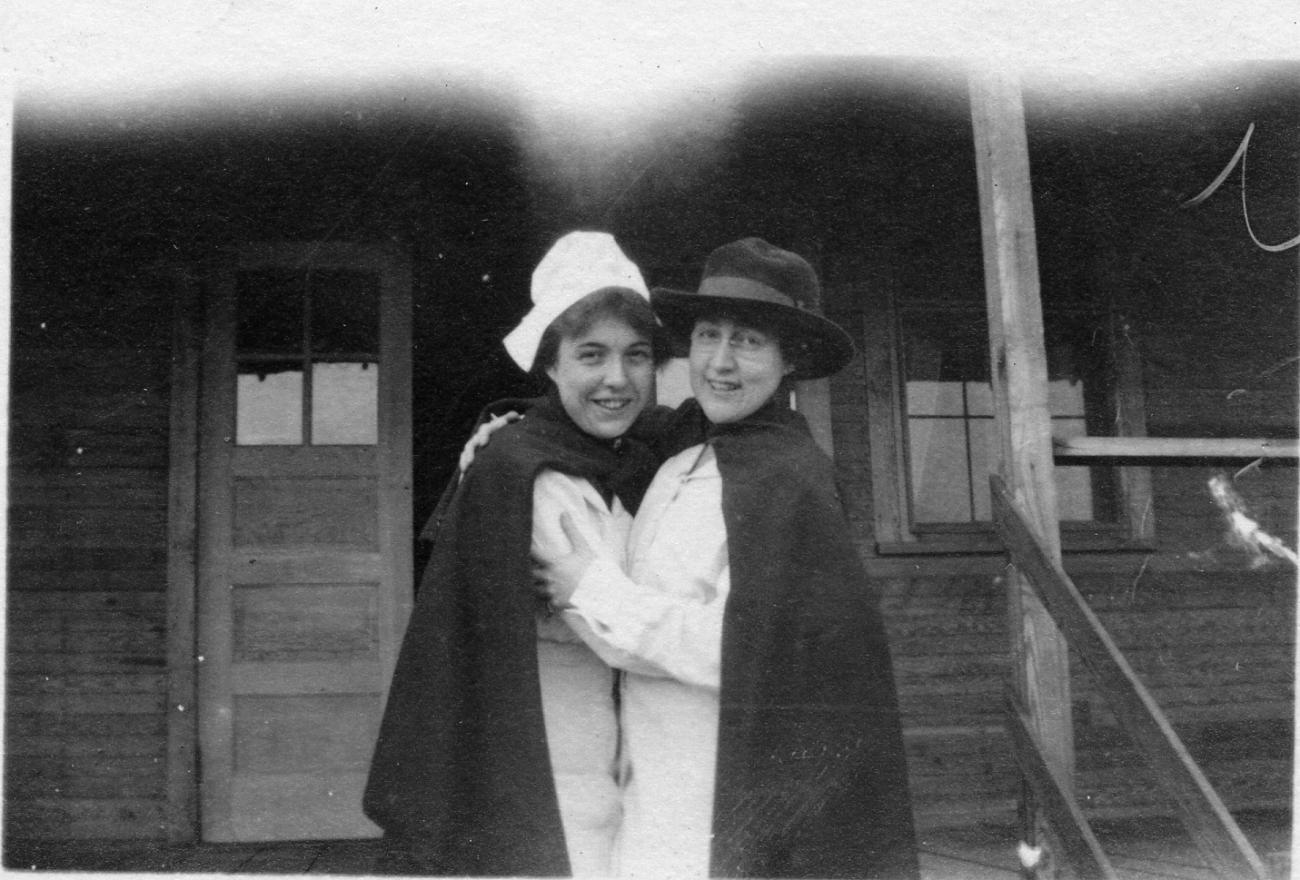 Harriet Elizabeth Putman with Unidentified Person in Front of Building at Camp Sherman