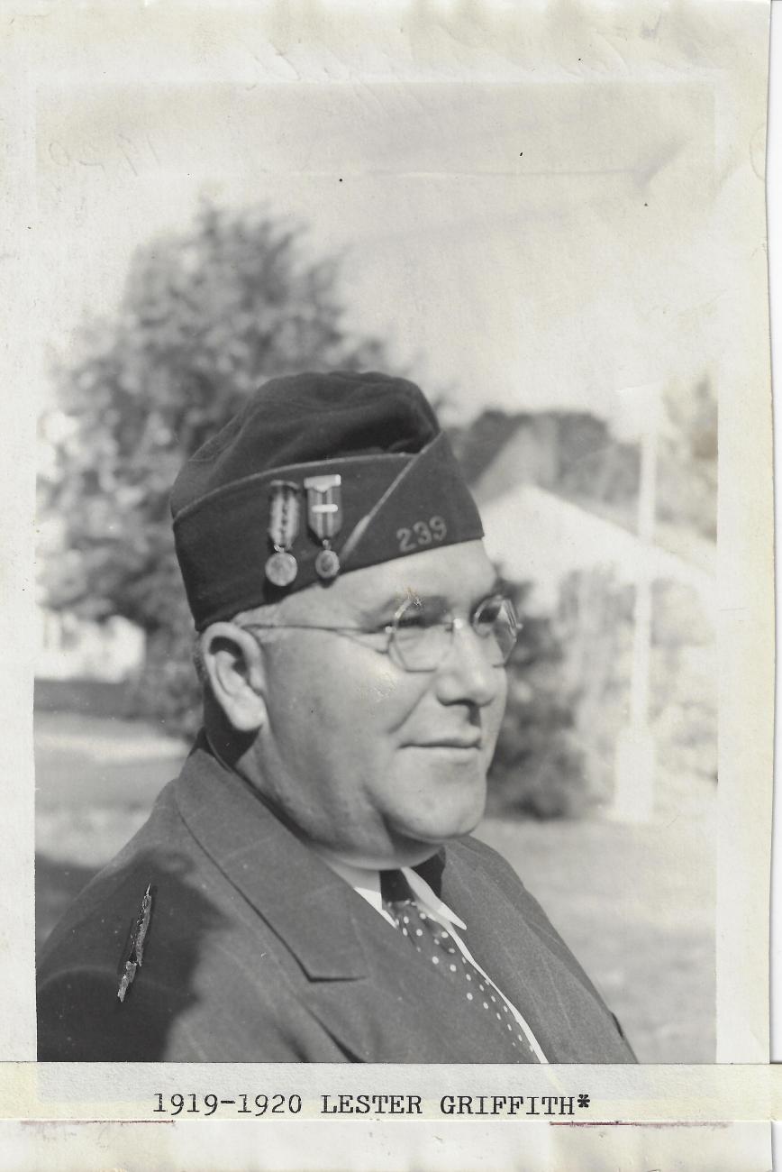Black and white photograph post commander in uniform outdoors in profile