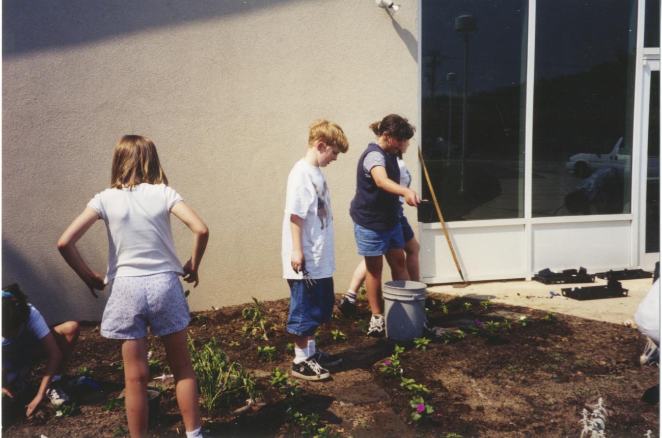 Photograph of Children Planting the Storybook Garden at Northwest Library
