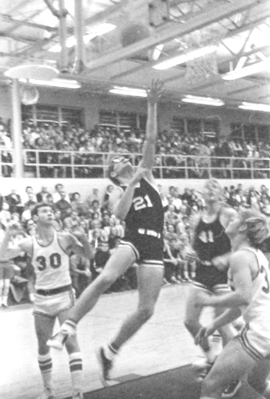 Photograph of John Snouffer Playing for Worthington High School Basketball Team at Westerville, 1970