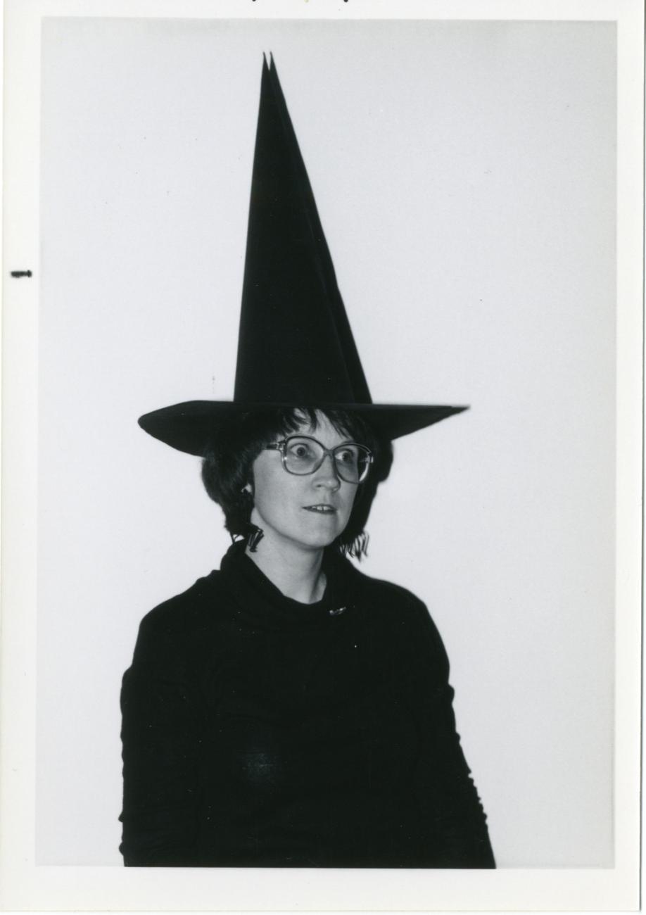 Photograph of Librarian Jo Osborne in a Witch's Hat