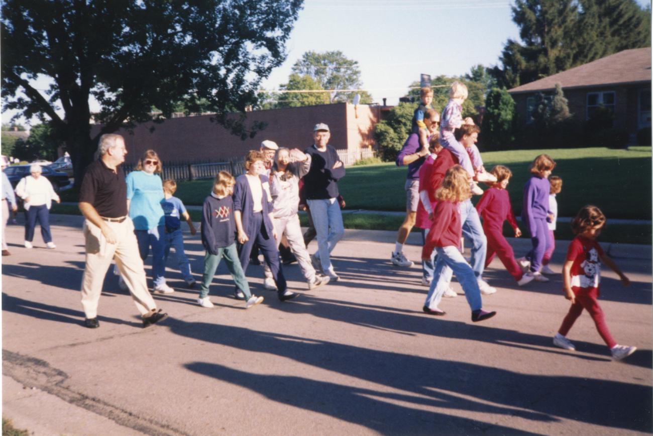 Photograph of Parade to Ribbon Cutting at Reopening of the Old Worthington Library