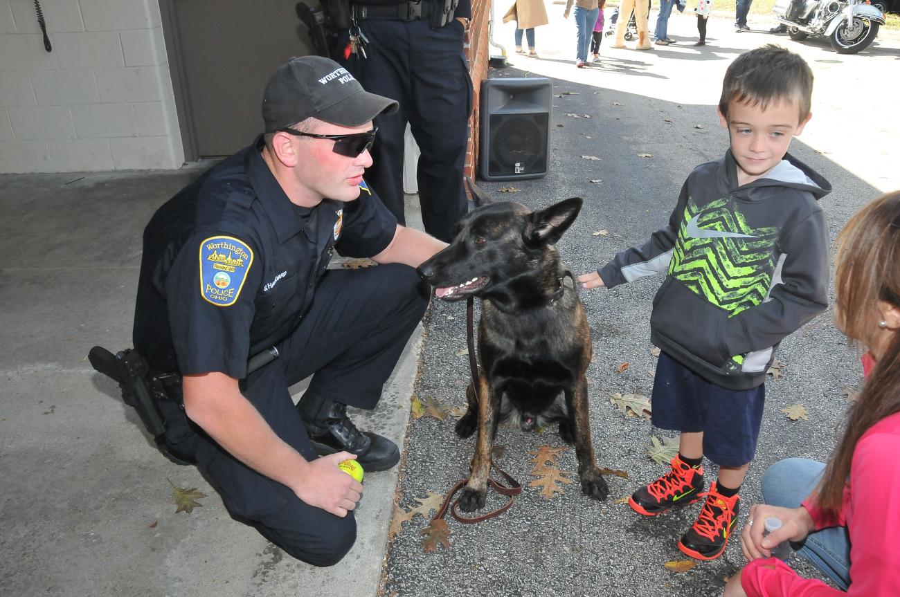 Photograph of Reserve Officer Sean Haggard and Shadow the police dog