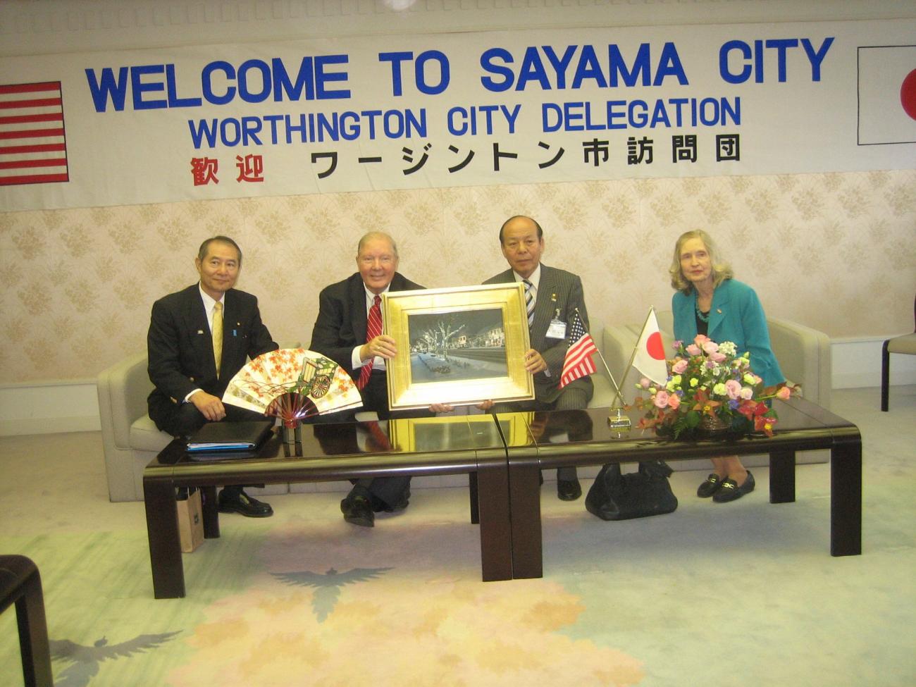 Photograph of a gift exchange during the 2009 Worthington mayoral delegation to Sayama, Japan