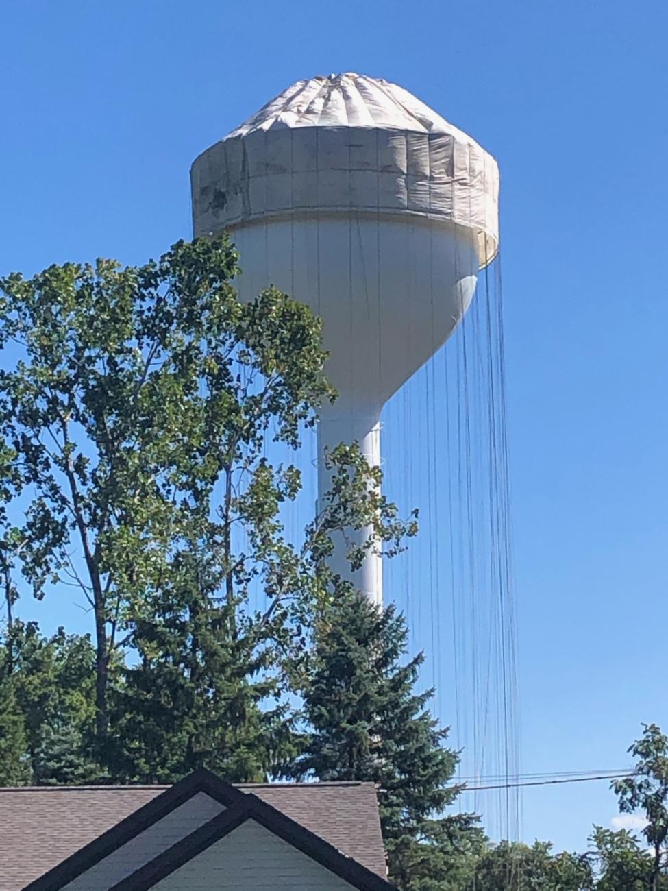 Photograph of the Worthington Hills Water Tower Repainted, Partially Covered by Tarp, 2020