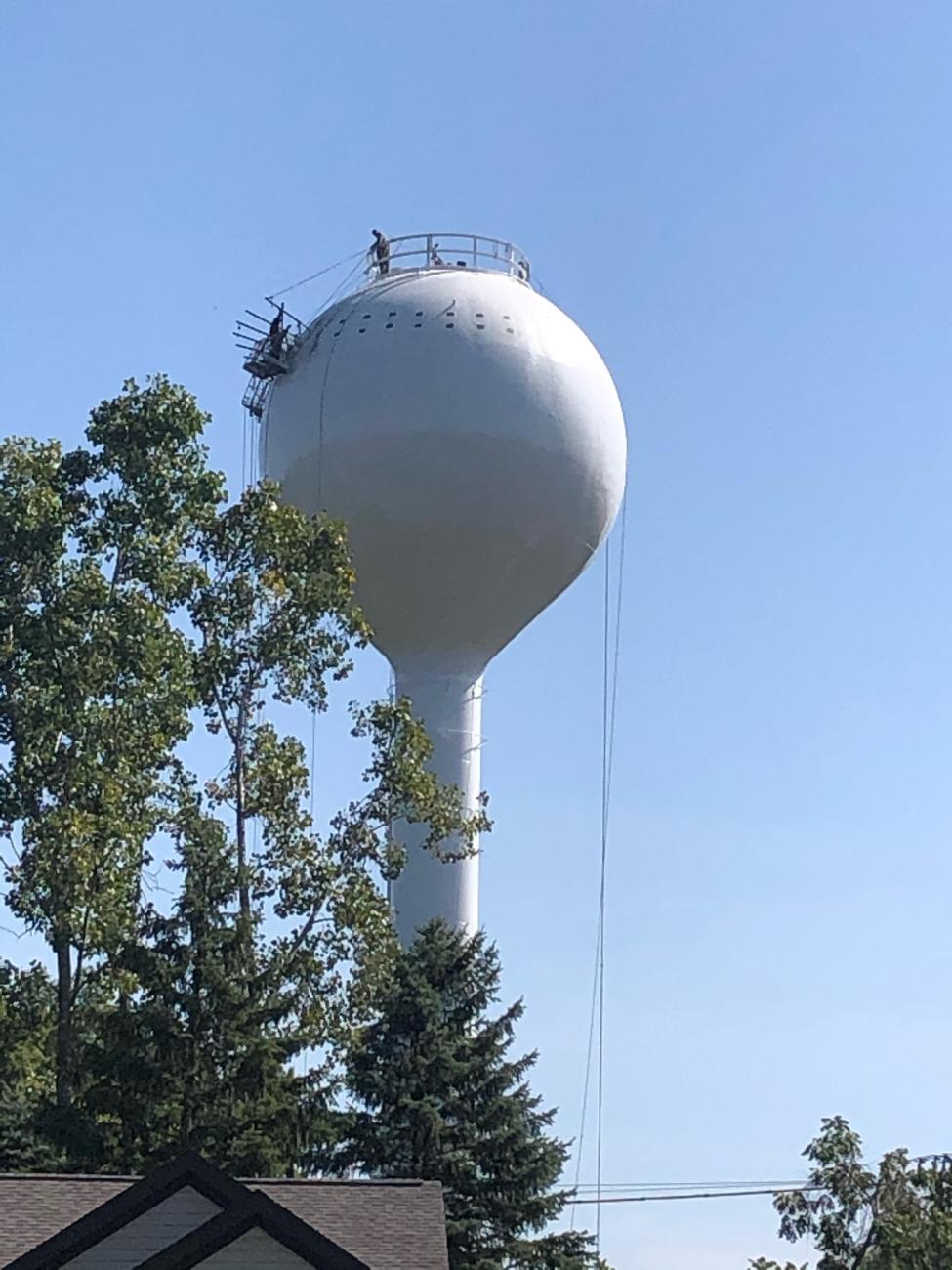 Photograph of the Worthington Hills Water Tower Repainting with Workers Removing Tarp Rig, 2020