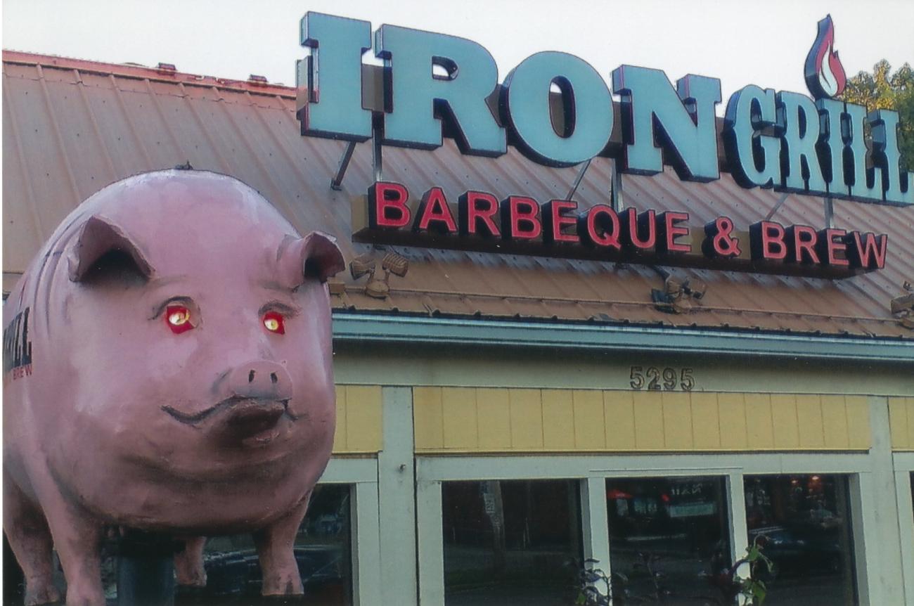 Pig Sign and Storefront for the Iron Grill Barbeque & Brew
