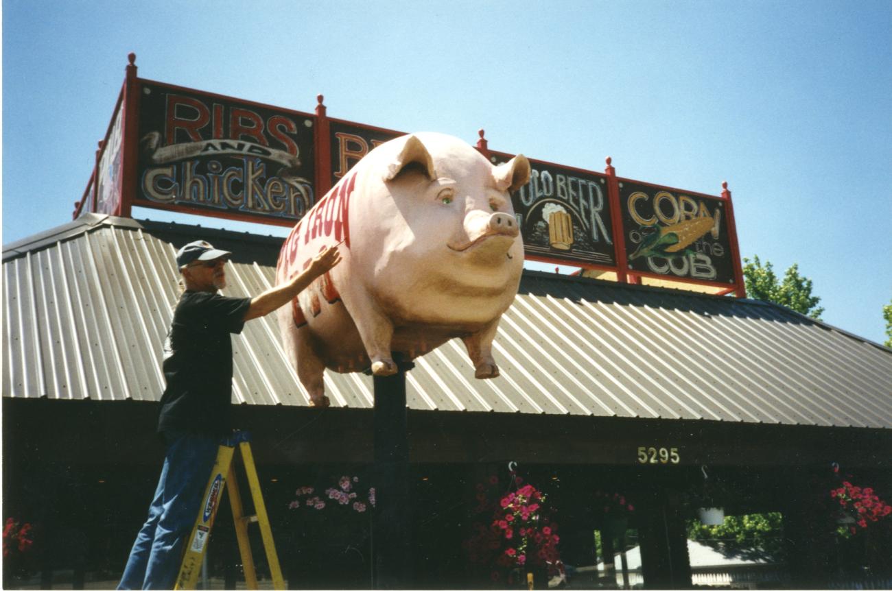 William (bc) (Bill) Collins with Pig Iron BBQ Pig Statue