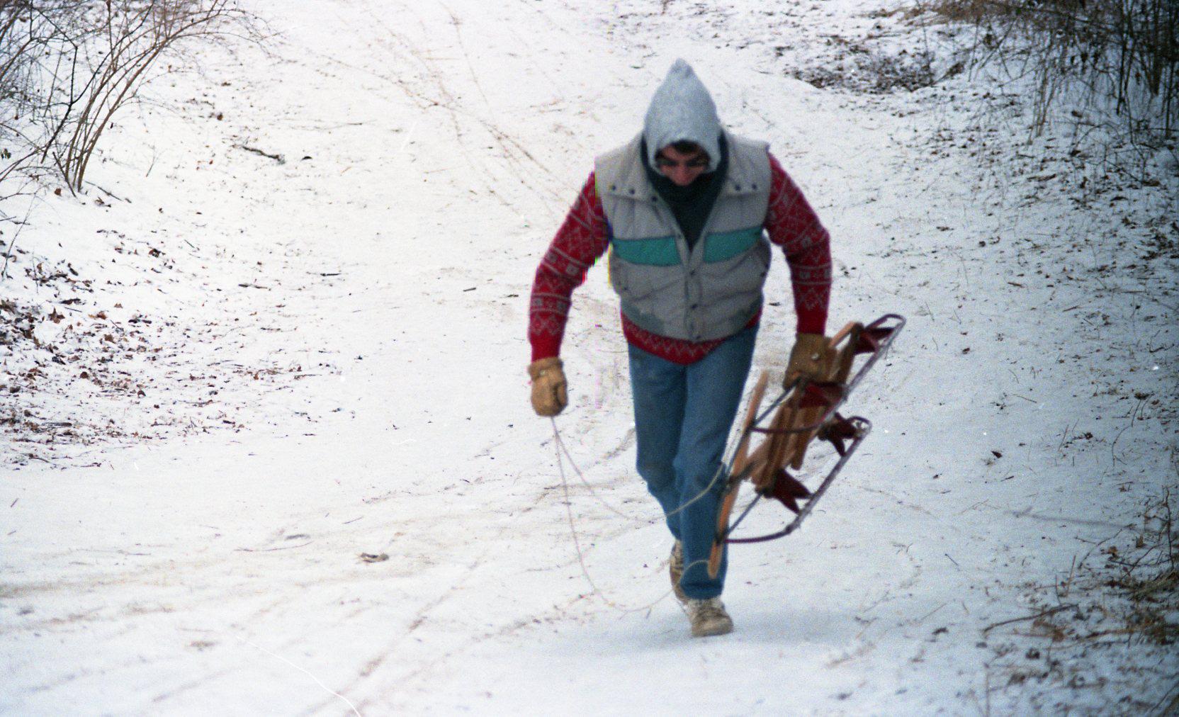 Andy Shirk Walking Up "Devil's Hill" Sled Run