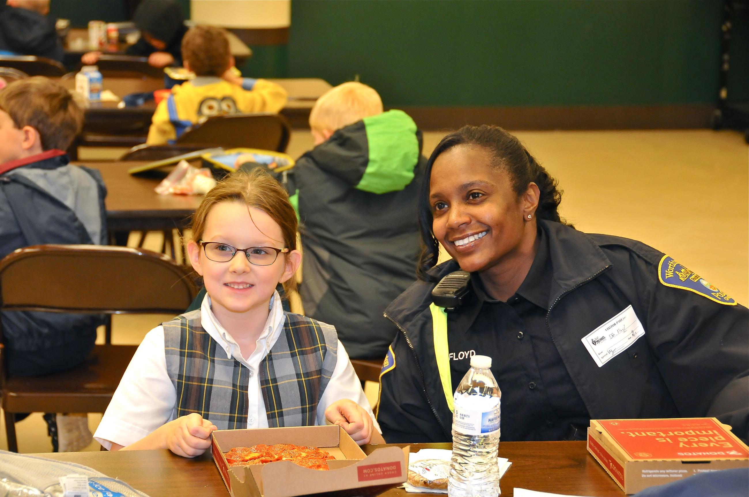 Community Resource Officer Tammy Floyd and Student at St. Michael School