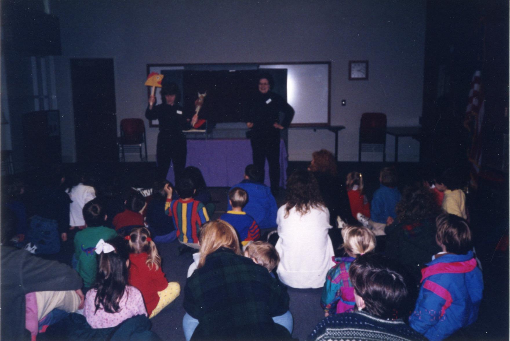 Karen Laird and Mary Jane Bellay Perform Puppet Show, Northwest Library