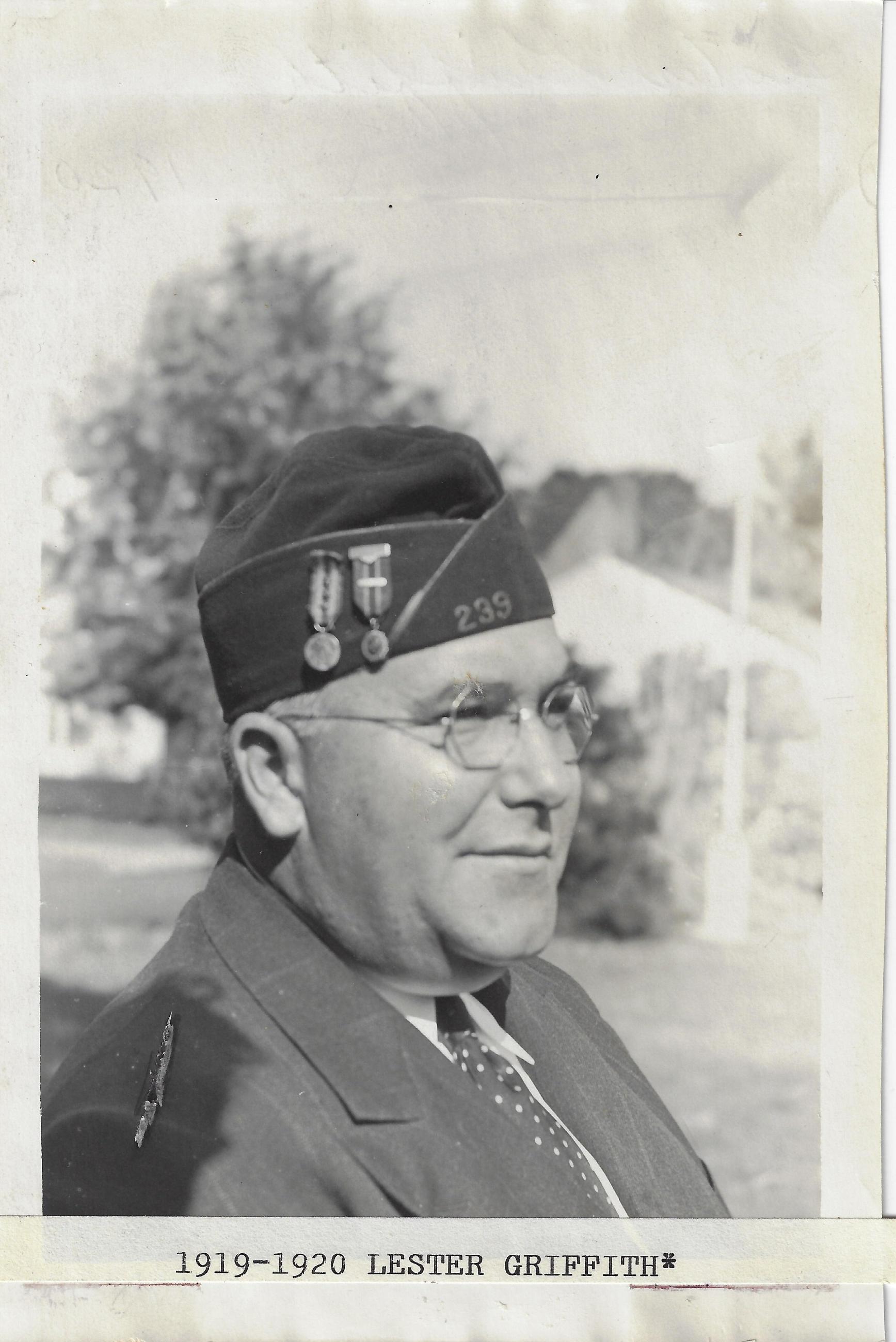 Black and white photograph post commander in uniform outdoors in profile