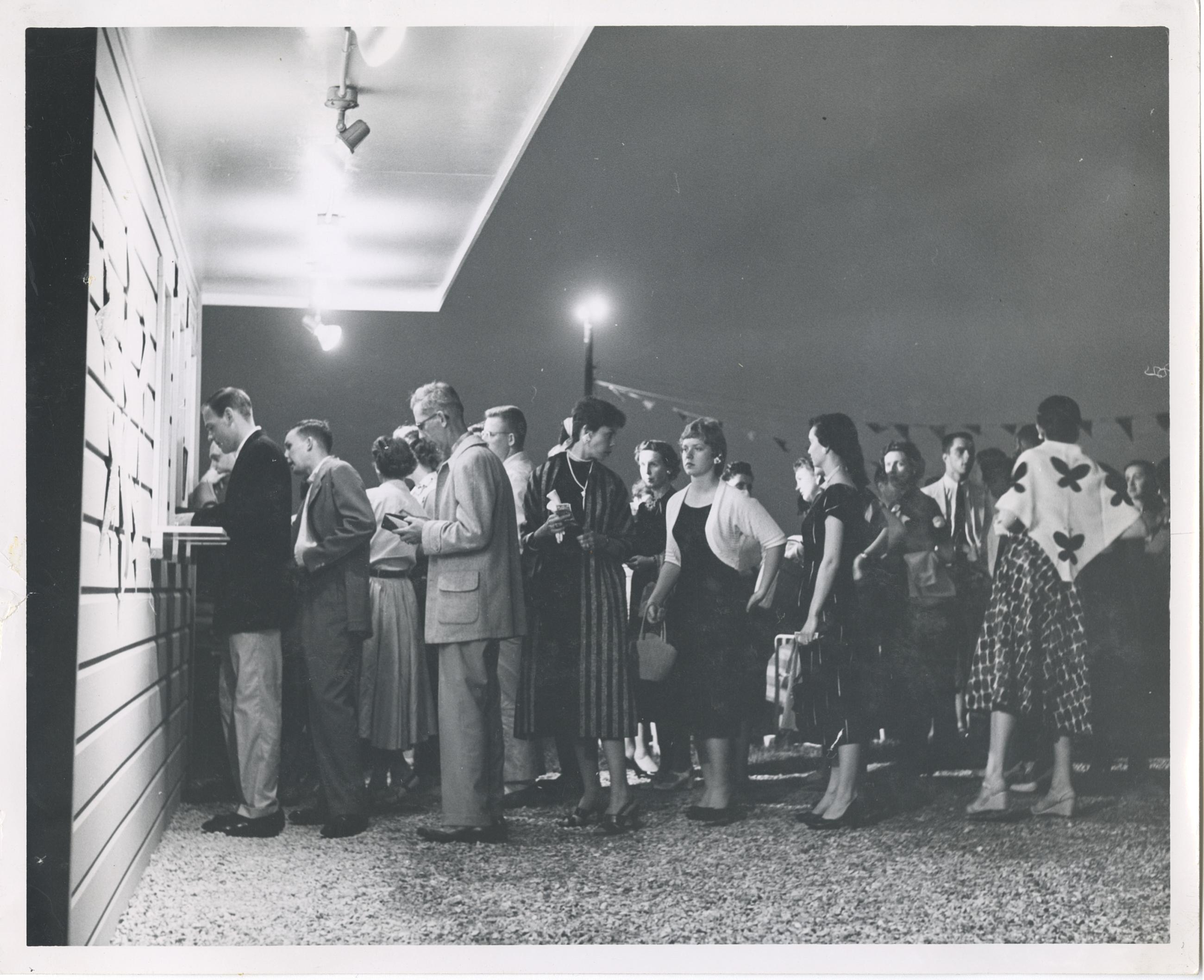 People Waiting in Line at the Box Office for Playhouse on the Green