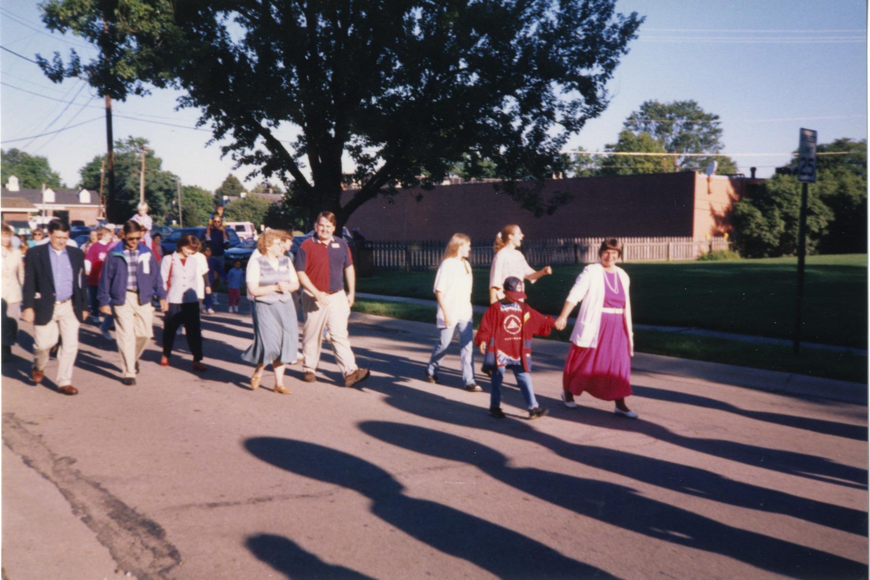 Photograph of Parade to Ribbon Cutting at Reopening of the Old Worthington Library