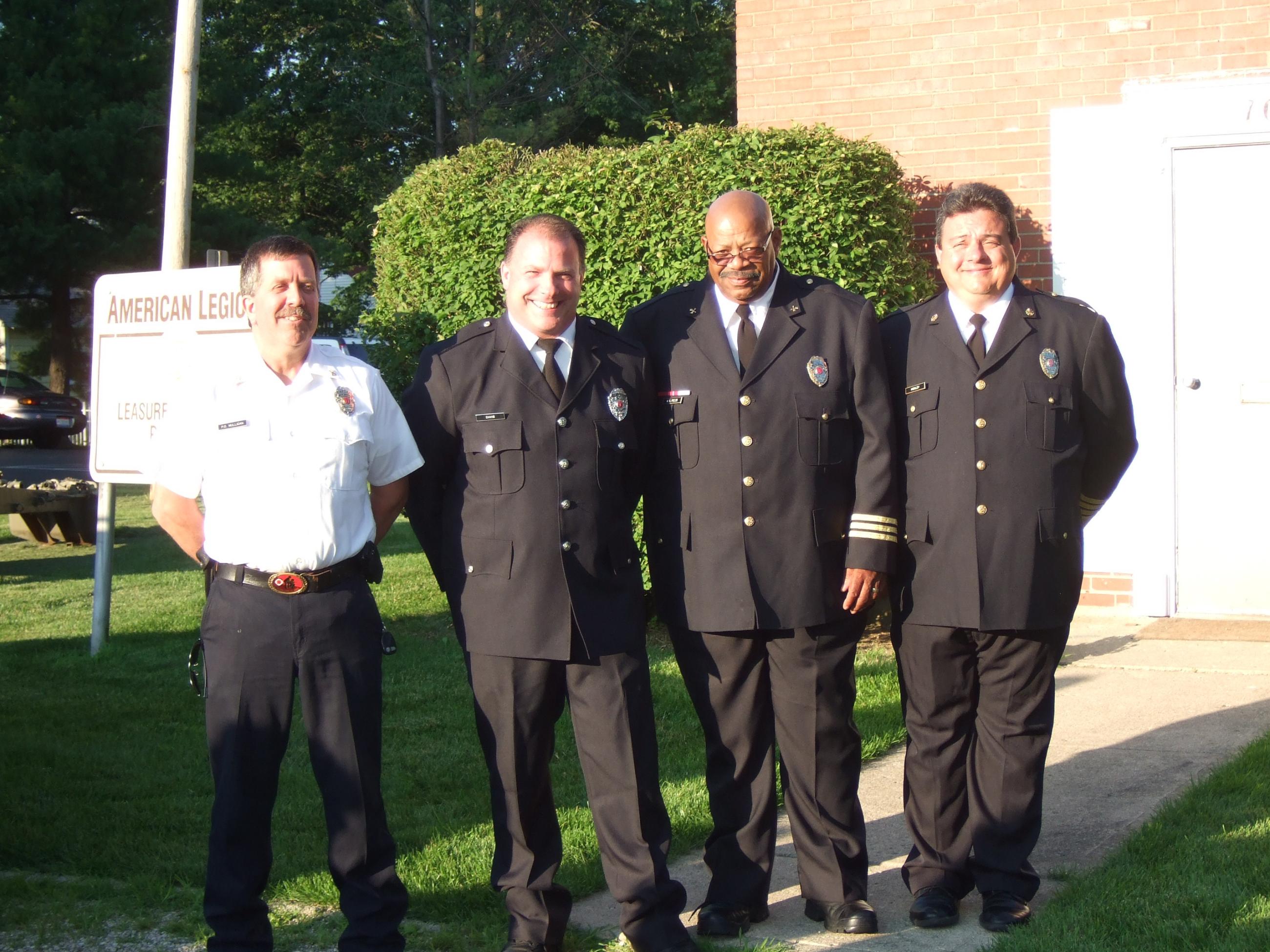 Photograph of Patrick Mulligan, Ron Davis, Bill Fields and Scott Highley at the 2010 Firefighter of the Year Ceremony