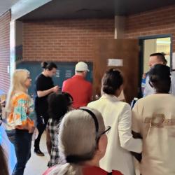 Attendees at the Thomas Worthington High School Alumni Tour, Gathered in Front of a Room
