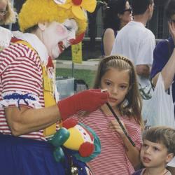 Clown Making Balloon Animals for Children at the Worthington Farmer's Market