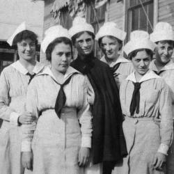 Black and white photograph of six women in World War I Army nurse uniform facing the camera