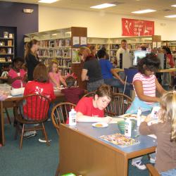 Photograph of Attendees Making Crafts at the Worthington Park Library Family Fun Night
