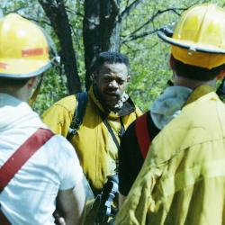 Photograph of William (Bill) Fields, Jr., Speaking to Firefighters