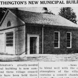 A black-and-white newspaper clipping with a headline above an image of a small brick building over a brief article
