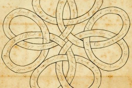 A sepia toned paper with intricate design with handwritten poetry within and below the design