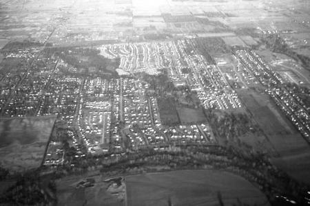 Black and white aerial photo of neighborhoods