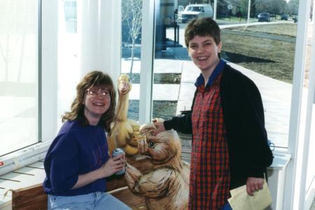 Danna Armstrong and Karen Laird with Northwest Library Story Garden Character Wilbur
