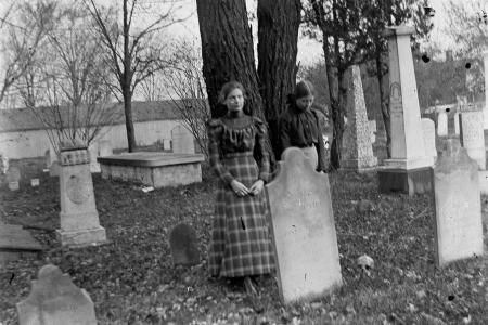 Edith Griswold and Ann Bower Standing in St. John's Churchyard