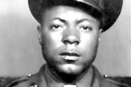 Black and white portrait photo of Herbert McGee in Army uniform