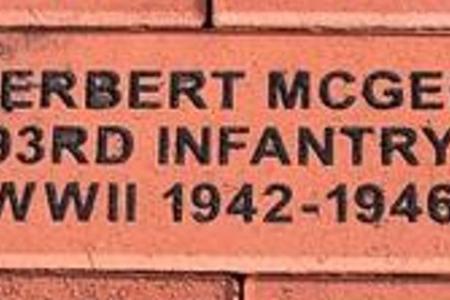 Color photo of a Memorial Brick for Herbert McGee at Motts Military Museum