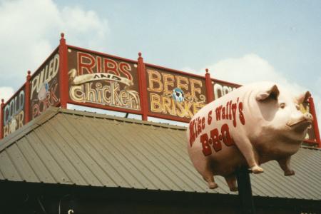 "Mike & Wally's" (Pig Iron) BBQ Pig Statue in Front of the Restaurant