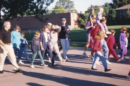 Photograph of Parade to Ribbon Cutting at Reopening of the Old Worthington Library