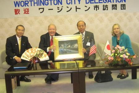 Photograph of a gift exchange during the 2009 Worthington mayoral delegation to Sayama, Japan