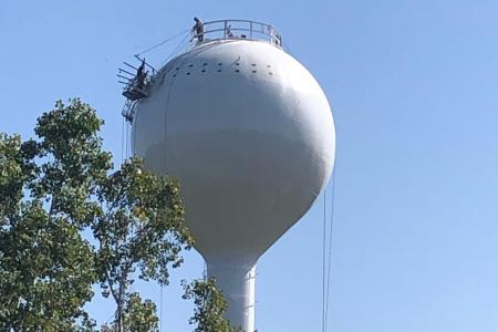 Photograph of the Worthington Hills Water Tower Repainting with Workers Removing Tarp Rig, 2020