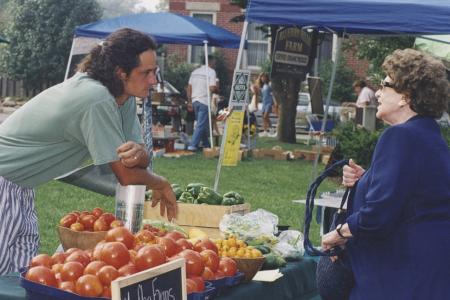 Shopper and Vegetable Vendor at the Worthington Farmer's Market