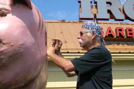 William (bc) (Bill) Collins Painting the Iron Grill Pig